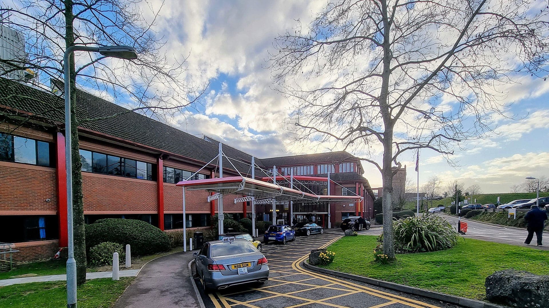 A Western Cars taxi at the main entrance of the Princess Royal Hospital in Haywards Heath